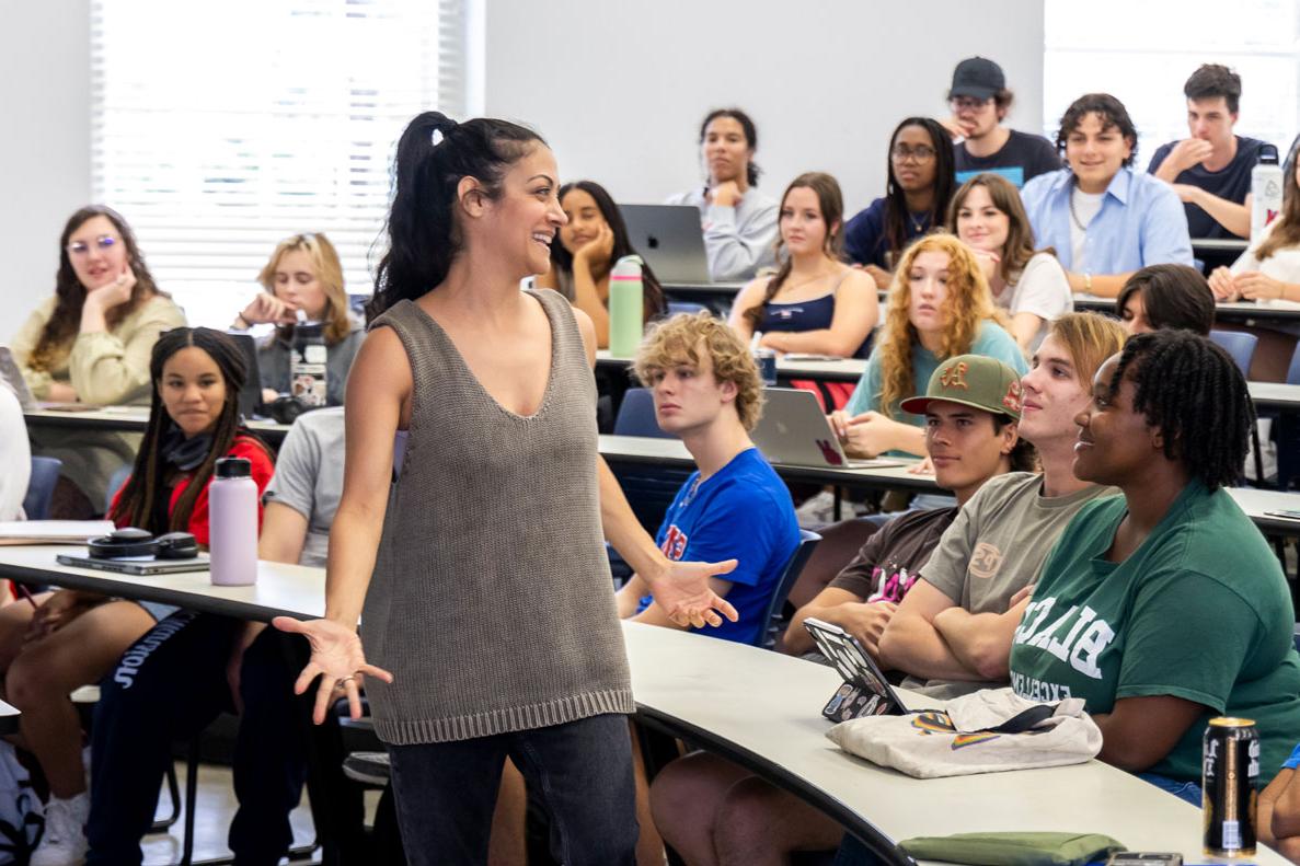 The First-Year Arts Community Experience class listens to a guest speaker.